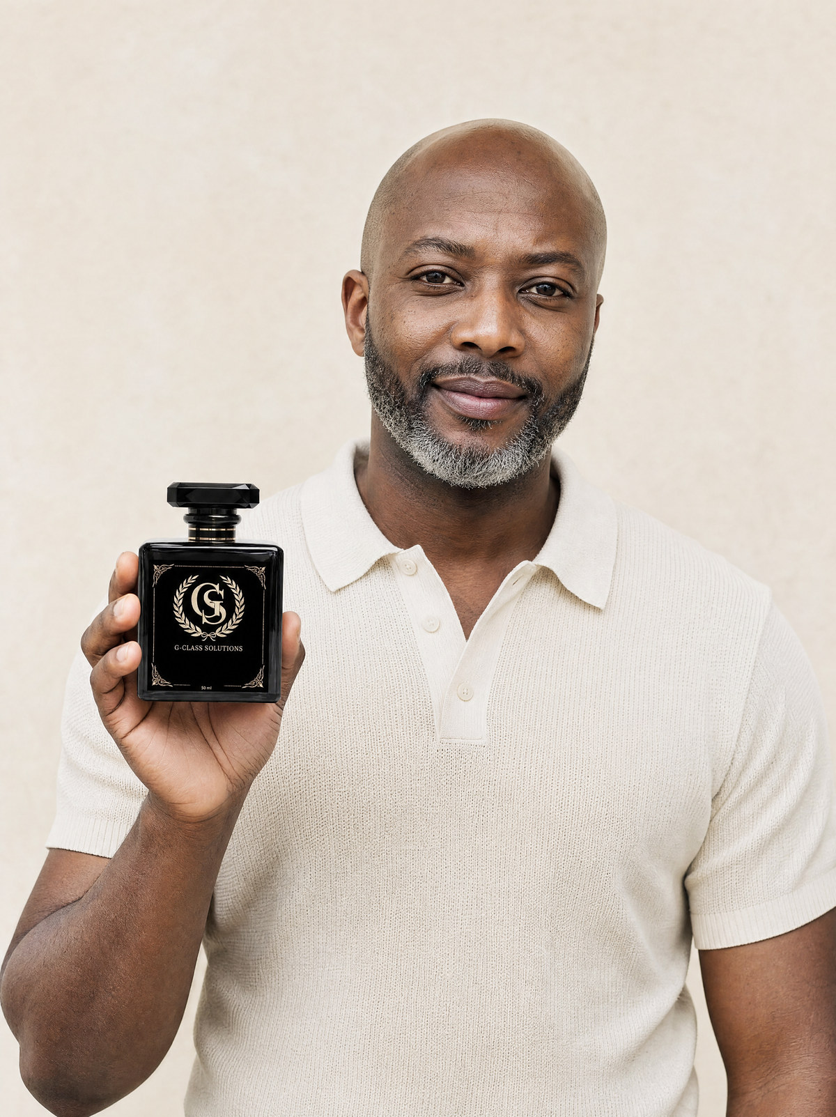 A G-Class Solutions distributor holding a perfume bottle